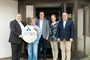 Ein Foto des Oberbürgermeisters mit Begleitern bei SLC